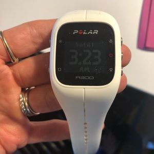 Polar AS300 (black and white bands) and charger
